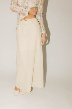 this long a-line maxi skirt is a neutral necessity. featuring cargo-inspired pockets + sleek seam detailing, it’s the perfect street-style maxi skirt for work lunches, casual outings, + everything in between. natural // maxi length, one button fly zip, pockets, elastic waist, seam detailing paired with our lizzy watercolor top model is 5'8" + wearing a small measurements are approximate + taken while laying flat small : waist 26” length 37” medium : waist 28” length 38” large : waist 30” length Skirt For Work, Work Lunches, Maxi Skirt Style, Work Skirts, Casual Spring, Small Waist, Outfit Idea, Top Model, Long A Line