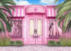 a pink store front with palm trees in the background