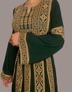 Traditional Tatreez Embroidered Palestinian is simple, elegant and perfect for a special event or even your day to day wear. The Classic Thobe has a tie back belt and can be adjusted as you wish! Details Available in a variety of colours. Please note that the embroidery on this dress is machine stitched and is only on the front of the dress. Size Guide Size may run large. Size 1 - Bust: 38" all around, Length: 59" Size 2 - Bust: 40" all around, Length: 59" Size 3 - Bust: 42" all around, Length: Arabic Embroidery, Middle Eastern Clothing, Jordan Outfits, Business Tops, Turkish Fashion, Stitch Art, Abaya Fashion, Simple Elegant, To Day