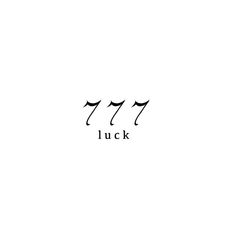 the word luck written in black ink on a white background