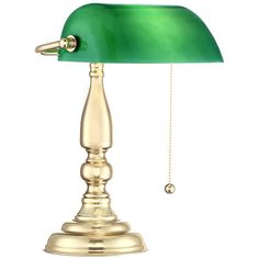 a green lamp on a gold base with a chain hanging from it's side