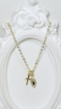 Gold Plated Brass Dainty 1mm Cable Chain is 16" with a 2" extender chain and lobster clasp. Necklace can be made shorter for children, by request in note section on order.  Gold Filled Brass Cross is 12x6mm Gold Filled Brass and Cubic Zirconia Mary Charm is 14.5x5.5mm Gift Ideas For Ladies, Blessed Mother Mary, Clasp Necklace, Blessed Mother, Mother Mary, How To Make Shorts, Gold Cross, Cable Chain, Lobster Clasp