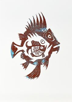 a fish that is painted on the side of a white wall with blue paint and black ink