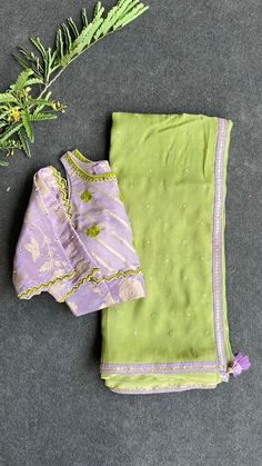 Product Descriptions : Green jute saree having embroidery works all over & heavy embroidery border works is paired up with lavender silk patterned pearl detailed hand works for front & sleeves as shown View this post on Instagram A post shared by Shobana G (@shobana_nithinn)