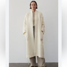 Zara Manteco Zw Collection Wool Robe Coat White Size M-L Retail $259 100% Wool Nwt Self Tie Belt Interior Lining Made Of Viscose Manteco Wool Patch Pockets Oversized Long Outerwear In Winter White, Cream Long Outerwear For Daywear, White Oversized Outerwear With Lapel Collar, Winter White Long Outerwear For Spring, Oversized Neutral Outerwear For Daywear, Cream Long Outerwear For Work, Long Cream Outerwear For Work, Long Beige Outerwear For Daywear, Neutral Outerwear With Pockets For Daywear