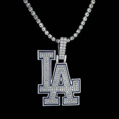 Nothing accentuates your fit like the perfect drip! GLD has teamed up with Major League Baseball to introduce the official MLB Team Pendants. This piece was meticulously crafted with clear hand-set stones and blue enamel to accurately depict the logo of the Los Angeles Dodgers. Boss up and rep your squad with the official logo pendant of the LA Dodgers! This product is guaranteed for life - GLD will repair the item should you experience any defects in craftsmanship or breakage. Specifications - Mlb Logos, Mlb Teams, Vermeil Jewelry, Custom Earrings, Los Angeles Dodgers, Major League Baseball, Pendant Bracelet, Drop Necklace, Major League