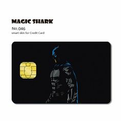 a batman credit card with the image of a man in a bat suit on it