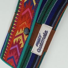 Beautiful Wallet Created And Designed By Guatemalan Artisans. It Has Vibrant Colors That Represent The Guatemalan Culture Very Well. It Has Impregnated The Name Of That Country. *Excellent Condition *New, Never Used. *Beautiful Vibrant Colors * It Has Two Compartments Inside *Inner Zippered Pocket For Coins. * Bohemian Style * Culture Style Thanks For Stopping By My Closet! Handmade Red Clutch Wallet, Handmade Red Pouch Wallets, Handmade Red Coin Purse For Travel, Handmade Pouch Wristlet For Daily Use, Multicolor Wristlet With Removable Pouch As Gift, Handmade Multicolor Wristlet For Everyday Use, Multicolor Handmade Wristlet For Everyday Use, Handmade Rectangular Wristlet For Everyday Use, Multicolor Rectangular Wristlet Gift