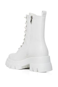 Seriously classic, and easy to style. The AZALEA WANG Siriusi Bootie In White is brought to you in a sleek faux leather upper and features a lace-up shaft, tonal stitching, silver metallic hardware, a durable stacked rubber outsole, and a round toe silhouette. Complete with a mid-calf shaft, a platform lug sole with a coordinating chunky heel, a back ankle pull tab, and an inner ankle zipper closure for optimal support. From skater dresses to an oversized tee with your favorite denim, the possibilities are endless when styling these go-to beauties.
(all measurements are approximate from size 7.5)
- Faux Leather Upper
- Almond Toe
- Mid-Calf Shaft
- 2.5” Heel Height
- 1.5” Sole Height
- 7” Shaft Height
- 11.25” Circumference
- Imported
Product ID: 379072 White Leather Shoes, Shoe Boot, Azalea Wang, Leather Boot Shoes, Skater Dresses, Oversized Tee, Lug Sole, Pull Tab, Chunky Heel