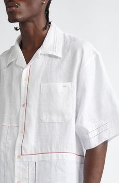 Put a fresh spin on your laid-back warm-weather look with this linen bowling shirt detailed with a bricolage of embroidery in assorted styles and hues. 28" length, 45" chest (size 48EU) Front button closure Convertible collar Short sleeves Chest patch pocket 100% linen Dry clean Made in Italy White Linen Camp Shirt With Pockets, White Relaxed Fit Collared Camp Shirt, White Relaxed Fit Camp Shirt With Spread Collar, White Unstructured Shirt With Camp Collar, Embroidered Collared White Camp Shirt, White Embroidered Collared Camp Shirt, White Embroidered Camp Shirt For Summer, White Embroidered Summer Camp Shirt, Embroidered White Short Sleeve Camp Shirt