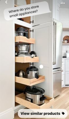 an open kitchen cabinet with pots and pans on the bottom shelf, which is labeled where do you store small appliances?