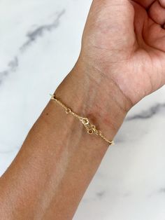 Simple and dainty - this Lightning bolt bracelet is a perfect minimal piece you can wear every day! Made from 925 Sterling Silver and detailed with mini bolts for a touch of fun. This bracelet is finished with a lobster clasp closure and offers three different rings for length closures. Adjustable Gold Bracelet With Extender For Everyday, Adjustable Minimalist 14k Gold Filled Charm Bracelet, Minimalist Adjustable Charm Bracelet With Delicate Chain, Dainty Adjustable Paperclip Bracelet With Delicate Chain, Adjustable Delicate Charm Bracelet, Adjustable Dainty Paperclip Bracelet, Delicate Adjustable Everyday Charm Bracelet, Delicate Adjustable Charm Bracelet For Everyday, Minimalist Adjustable Paperclip Bracelet With Extender