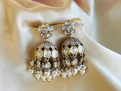 Tayani statement 22k Gold plated Pearl jhumki Earrings. Tayani earrings Elegant Jhumkas With Intricate Design For Navratri, Elegant Navratri Jhumkas With Intricate Design, Elegant Danglers For Navratri, Formal Festive Jhumkas With Latkans, Gold Jhumkas With Cutdana For Formal Occasions, Elegant Kundan Jhumkas For Eid, Elegant Navratri Jhumkas, Cutdana Jhumkas For Diwali Formal Occasions, Bollywood Style Formal Jhumkas For Diwali