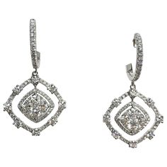 These shimmering drop earrings are a terrific finish to an already-beautiful anytime looks. Crafted in 18K white gold, each earring features in sparkling diamonds. Buffed to a brilliant luster, these earrings secure with lever backs. This earring setting with totaling 2.92 carat, made in 18K white gold. Sparkling Diamond White Fine Jewelry Earrings, Dazzling Diamond White Drop Earrings, Formal Dangle Diamond Earrings With Pave Setting, Sparkling Diamond Drop Cluster Earrings, Fine Jewelry Sparkling Diamond Earrings, Dazzling Sparkling Diamond Dangle Earrings, Dazzling Diamond Dangle Earrings With Accents, Dazzling Diamond Dangle Earrings, Dazzling Diamond Drop Earrings