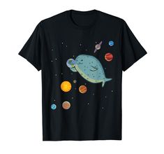 a black t - shirt with an image of a whale and planets in the sky