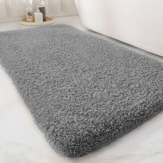 a bathroom rug is shown on the floor