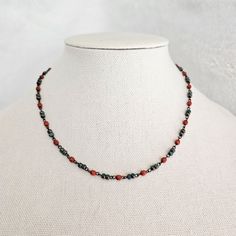 A cute Small Beaded Boho Choker necklace that grabs attention! Give this simple piece of jewelry as a gift for your mom, wife, or girlfriend...anytime!!  SIZE  *Necklace Length - 15, 16, 17, 18 inches  ITEM DETAILS  *Material - Glass, Bronze *4mm double tri cut aqua teal beads alternating 4mm bright tomato red faceted cut beads come together to make this Rustic Beaded Necklace. *The Czech beads are connected with antique bronze chain links. *An antique bronze lobster clasp finishes the look of t Dainty Red Beaded Necklaces With Round Beads, Dainty Red Beaded Necklace With Round Beads, Red Crystal Necklace With Colorful Beads For Gift, Red Dainty Necklace With Colorful Beads, Dainty Red Necklace With Colorful Beads, Dainty Red Beaded Necklace, Faceted Beads Choker As Gift, Faceted Beads Choker Gift, Gift Single Strand Crystal Choker Necklace