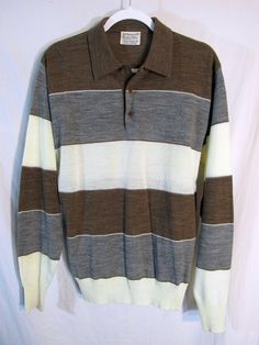 "The quintessential 70's sitcom shirt! It's a 1970s Vintage Mister Man Men's Long Sleeve 2ply Knit Pullover Shirt, in fact. Measured Size 22.5\" P2P (tag size XL), Cream / Brown / Gray Dig those stripes! Condition: ready for Jack Tripper. AS close to unworn as I've seen, and smoke free. Dig the 70'S well you'll dig my store - check it out! Measurements: Label size: Extra Large Shoulder-to-shoulder: 18.5\" Chest across: 22.5\" Waist across: 20\" Bottom hem across: 14\" relaxed Sleeve from shoulde Brown Long Sleeve Cotton Polo Sweater, Classic Striped Cotton Sweater, Retro Collared Polo Sweater For Fall, Retro Long Sleeve Cotton Polo Sweater, Retro Collared Cotton Sweater, Retro Cotton Collared Sweater, Casual Striped Collared Sweater, Fall Striped Collared Polo Sweater, Fitted Retro Striped Sweater