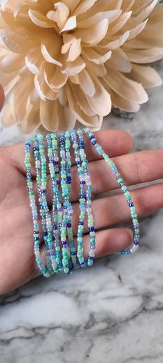 This listing is for a single strand blue seed bead bracelet. They are stackable and are perfect for the beach, your boho outfit, your minimalist look. This dainty bracelet would be a great gift for her, for a friend and for family members! Pick your length! Blue Beaded Heishi Friendship Bracelets, Blue Heishi Beads Bracelet With Tiny Beads, Dainty Blue Beaded Bracelets With Faceted Beads, Dainty Blue Friendship Bracelets With Colorful Beads, Blue Tiny Beads Beaded Bracelets For Beach, Festival Stretch Bracelet With Colorful Beads In Blue, Blue Stretch Bracelet With Colorful Beads For Festival, Blue Colorful Waist Beads As Gift, Dainty Blue Friendship Bracelets With Tiny Beads