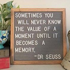 a sign that says sometimes you will never know the value of a moment until it becomes a memory