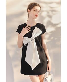 Get 10% off now! Buy cute bow knot black and white mini dress at cheap price online. Free stable shipping and pro custom service since 2009. Chic Mini Dress With Bow Print, Elegant Mini Dress With Bow Print, Black Bow Tie Dress For Party, Black Party Dress With Bow Tie, White Mini Dress With Bow For Formal Occasions, Chic Black Dress With Satin Bow, Black Bow Print Summer Dress, Party Dress With Bow Print And Short Sleeves, Short Sleeve Party Dress With Bow Print