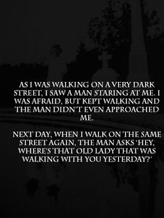 a black and white photo with the words as i was walking on a very dark street