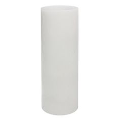 a tall white vase sitting on top of a table