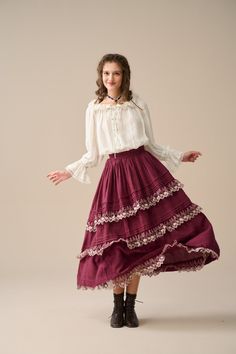 Step back in time with our Victorian Style Skirt, where every stitch reflects exceptional craftsmanship. Revel in the elegance of this skirt adorned with a graceful flare that flows seamlessly as you walk or dance, creating a captivating presence at the Renaissance Festival or any historical event.  You'll be pleased with these ruffles. Why not pair it with a simple, casual blouse and let this skirt be the focal point of your look. 【Fabric】 Plum/brown: 100%Linen, around 200g/gram. Medium weight. Wheat/Black: 100% Velvet 【Size】 *SIZE XS waist: 26"/ 65 cm *SIZE S waist: 27"/ 70 cm *SIZE M waist: 29/ 75 cm *SIZE L waist: 31.5" / 80 cm SIZE XL Waist: 33"/ 85cm SIZE XXL waist : 35" / 90 cm SIZE 3XL waist : 37" / 95 cm Bohemian Lace Lined Skirt, Victorian Skirt With Ruffles, Fitted Vintage Skirt With Historical Design, Vintage Long Lace Skirt, Fitted Vintage Skirt With Lace Patchwork, Vintage Lace Skirt With Lace Patchwork, Vintage Lace Tiered Skirt, Fitted Lace Trim Cottagecore Skirt, Fitted Cottagecore Skirt With Lace Trim