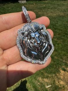 Gorgeous Lion pendants! Not the iciest ones we ever made but by FAR the MOST DETAILED! Set with moissanite stones Handmade by veteran Italian jeweler (making each pendant by hand takes over 4 hours of labor) You will not find a similar lion piece for even 5x the price anywhere else! VVS D color excellent cut moissanite stones PASSES DIAMOND TESTER ANY PEN OR LIGHT TRANSMISSION DIAMOND TESTER (Will show up as moissanite and not diamond on lab assays however) Comes with GRA certificate       SUPER 10k Gold Chain, Red Stone Ring, Lion Pendant, Diamond Tester, Colored Engagement Rings, Moissanite Earrings, Turquoise Rings, Gold Bracelet Chain, Engagement Ring Wedding Band