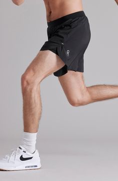 Lightweight and stretchy, these running shorts made with recycled fibers feature an odor-fighting compression layer and open sides for easier range of motion. A secure pocket for small essentials and a loop to hold a T-shirt allow you to enjoy hands-free, distraction-free runs. 5" inseam; 26" leg opening; 13" front rise; 114 1/2" back rise (size Medium) Elastic waist with internal drawcord Back zip pocket; T-shirt loop Interior compression shorts GoldFusion™ antimicrobial technology with gold na Jogging Athletic Shorts With Built-in 4-way Stretch, Black Compressive Activewear For Running Errands, 4-way Stretch Athletic Shorts With Built-in Shorts For Jogging, Functional Black Athletic Shorts With Light Support, Stretch Athletic Shorts For Jogging With Go-dry Technology, Stretch Athletic Shorts For Running With Light Support, Stretch Go-dry Athletic Shorts For Jogging, Stretch Athletic Shorts With Go-dry For Jogging, Stretch Athletic Shorts With Light Support For Running