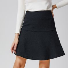 This minimalist short skirt features an adjusted cut on the hips and a flared yoke down to the hem. To wear with the associated jacket: an ensemble that is suitable for professional or semi-formal occasions, for a polished look and a refined style. Main material: 55% Polyester, 45% Wool. Lining: 95% Polyester, 5% Elastane.  Washing temperature 30° maximum in delicate cycle. Low ironing temperature / bleaching prohibited. Do not tumble dry. Panel Skirt, Paneled Skirt, Refined Style, Versatile Outfits, Gifts For New Mums, Blazer With Jeans, Pearl Jewellery Earrings, August Birth Stone, Short Skirt