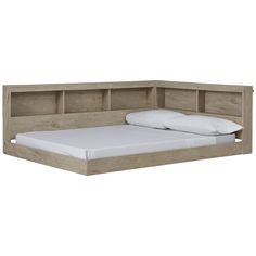 a bed with a headboard made out of wood and white sheets on top of it