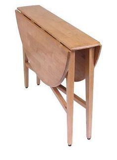 a small wooden table with one drawer open