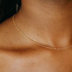 Ellis Chain Gold Plated Chain Necklace With Delicate Rectangular Links, Dainty Delicate Chain Link Necklace, Dainty Delicate Chain Necklace, Elegant Figaro Chain Choker, Delicate Gold-plated Figaro Chain Necklace, Delicate Gold Plated Figaro Chain Necklace, Minimalist Figaro Chain Choker Necklace, Figaro Chain Choker Necklace As Gift, Figaro Chain Choker Necklace For Gifts