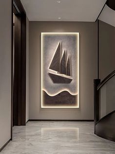 an art piece is shown in the hallway with lights on it and a painting hanging from the wall