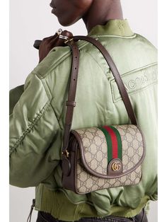 GUCCI Ophidia leather-trimmed printed coated-canvas shoulder bag | NET-A-PORTER Gucci Crossbody Shoulder Bag For Everyday Use, Gucci Shoulder Satchel, Gucci Crossbody Shoulder Bag For Travel, Gucci Crossbody Satchel With Detachable Strap, Designer Gucci Shoulder Satchel, Gucci Coated Canvas Satchel Bag, Gucci Monogram Canvas Crossbody Shoulder Bag, Gucci Brown Flap Bag, Gucci Coated Canvas Crossbody Bag