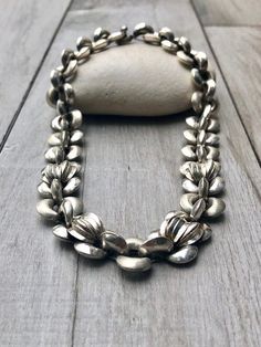 "Handmade vintage choker. All sterling silver One of a kind. It is in excellent conditions. Reliable box lock with safety chain The design is very similar to A. Belgiorno's and probably made by one of his artisans in Buenos Aires back in the 70's. 16\" long .75\" wide 10mm deep" Vintage Link Jewelry For Anniversary, Vintage Sterling Silver Jewelry With Box Clasp, Silver Artisan Choker Jewelry, Artisan Silver Choker Jewelry, Vintage Sterling Silver Necklace With Silver Clasp, Handmade Silver Oval Link Jewelry, Sterling Silver Jewelry With Box Clasp, Antique Silver Link Necklace, Vintage Silver Link Necklace