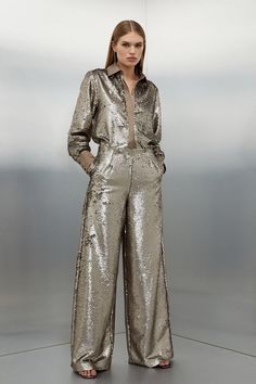 The Ultimate Party Piece, These Sequinned Pants Are Cut In A Relaxed Wide Leg Style To Exude After-Dark Decadence. Make An Instant Statement And Style This Standout Piece With The Matching Shirt And Barely-There Heels.Pantssequinshigh Waistedwide Leg Shiny Trousers Outfit, Sparkle Pants, Plus Size Workwear, Nye Outfits, New Years Eve Dresses, Eve Dresses, New Years Eve Outfits, Karen Millen, Petite Dresses