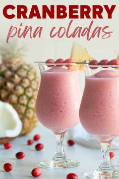 two glasses filled with cranberry pina colas on top of a table