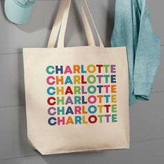 Personalized with any name in your choice of color Holds various items while travelingIncludes one tote bagCotton canvas bag with natural web strapsMachine washMeasures 20" W x 15" H x 5" DWeighs .5 lb.Imported Whether a trip to the library, preschool or grandma's house they need a special spot for all their belongings! The Vibrant Name Personalized Canvas Tote Bags are just the place to stash their special things. Multicolor Personalized Bags For Everyday Use, Personalized Multicolor Bags For Everyday, Everyday Personalized Multicolor Bags, Personalized Cotton Canvas Travel Bag, Personalized Multicolor Bags For Everyday Use, Personalized Cotton Canvas Bag For Travel, Customizable Cotton Canvas Bag For Travel, Personalized Cotton Canvas Bag For School, Personalized Cotton Canvas School Bag