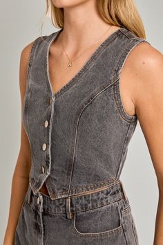 Washed black v-neck sleeveless denim romper! -Model is wearing a small MODEL SPECS HEIGHT: 5'8" BUST: 32A WAIST: 24" HIPS: 34" Fabric Contents 100% COTTON Trendy V-neck Denim Jumpsuit For Spring, Spring Cotton V-neck Denim Jumpsuit, Fitted Casual Denim Vest With V-neck, Cotton V-neck Denim Vest For Summer, Spring Washed Sleeveless Denim Jumpsuit, Sleeveless Washed Denim Jumpsuit For Spring, Fitted Washed Vest For Summer, Spring Sleeveless Washed Denim Jumpsuit, Fitted Denim Jumpsuit With V-neck In Casual Style