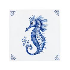 a blue and white tile with a sea horse on it