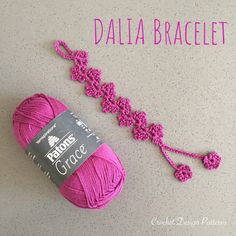 a pink ball of yarn next to a crochet hook with the words dalla bracelet written on it