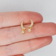 Pair of Star Moon Stud Earrings 925 Sterling Silver 14K Gold cz cubic zirconia * Material: High Quality Solid 925 Sterling Silver  O T H E R ∙ I N F O R M A T I O N * All items are nicely packaged ready to gift in elegant jewelry boxes. * If you can't find the information you need or need some advice for your design? Feel free to contact us. We are fast to reply :) T U R N ∙ A R O U N D ∙ T I M E * This design is ready to ship in 1 - 2 business days. If you have custom made items in your cart, y Celestial Gold Cubic Zirconia Earrings, Gold Celestial Cubic Zirconia Earrings, Celestial Yellow Gold Cubic Zirconia Earrings, Gold Celestial Earrings With Diamond Accents, Celestial Gold Earrings With Diamond Accents, Ethereal Jewelry, Moon Stud Earrings, Moon Studs, Star Moon