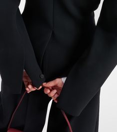 Find JACQUEMUS La Veste Ovalo Jacket on Editorialist. Material: 100% polyester. Care instructions: dry clean. Made in Bulgaria. Lining: 100% viscose. Closure: buttoned front. Pockets: welt pockets. Shoulder pads. Black Blazer With Concealed Placket For Spring, Spring Black Blazer With Concealed Placket, Black Evening Outerwear With Concealed Placket, Black Blazer With Concealed Front Fastening For Evening, Sleek Outerwear With Concealed Placket For Evening, Collarless Jacket, Statement Jacket, Wool Blend Jacket, Lace Jacket