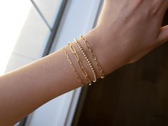 "Regular link chain or skinny link chain... or BOTH. Take your pick and layer them. Materials: * Gold Plated Style: -Skinny Link Chain Bracelet -Regular Link Chain Bracelet -Full Set of 2 Bracelets (Skinny Link and Regular Link) Bracelet Sizes: S/M: 6\"-7.5\" M/L: 7\"-8.5\" Message me/leave a note to request a length not listed above. Want to see more gold bracelets? Click here: https://www.etsy.com/shop/myleejewelry?ref=simple-shop-header-name&listing_id=788986592&section_id=28627838 Ha Bracelet Stacking, Link Chain Bracelet, Gold Bracelets, Cute Bracelets, Drawstring Pouch, Bracelet For Women, How To Apply Makeup, Bracelet Stack, Chain Link Bracelet