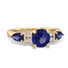 an oval blue sapphire and diamond three stone ring