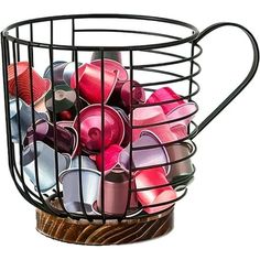 a wire basket filled with lots of different colored items