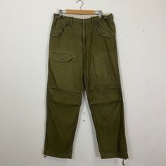 [DESCRIPTION] Please read the description first before buy my items‼️‼️‼️ Vtg John Bull Tactical Multipocket Utility Cargo Rare Pants All in good condition [MATERIAL] Cutton [MEASUREMENT] Measurement ( WHEN LAID FLAT ): Waist: 33 inch (recommended) Insean: 30.5 inch Length: 40.5 inch Front Rise: 11 inch Thigh: 22 inch Opening Leg: 16 inch [CONDITION] - All in good condition  - Have pinhole [PAYMENT & NOTICE] - We accept PayPal ONLY - No return/refund - All items will be post over shipping compan Military Cargo Style Full Length Bottoms, Military Cargo Bottoms Full Length, Full-length Military Cargo Bottoms, Combat Style Wide Leg Outdoor Bottoms, Combat Pants With Side Pockets And Straight Leg, Full Length Military Cargo Bottoms, Combat Straight Leg Pants With Side Pockets, Military Style Wide Leg Bottoms For Outdoor, Outdoor Combat Wide Leg Bottoms