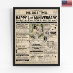 an old newspaper with the words happy 1st anniversary on it and a flag in the background